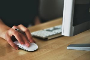 Free Person Holding Apple Magic Mouse Stock Photo